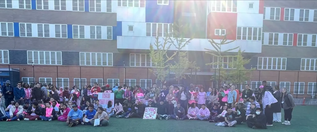 Breast cancer awareness walk group shot in the school yard