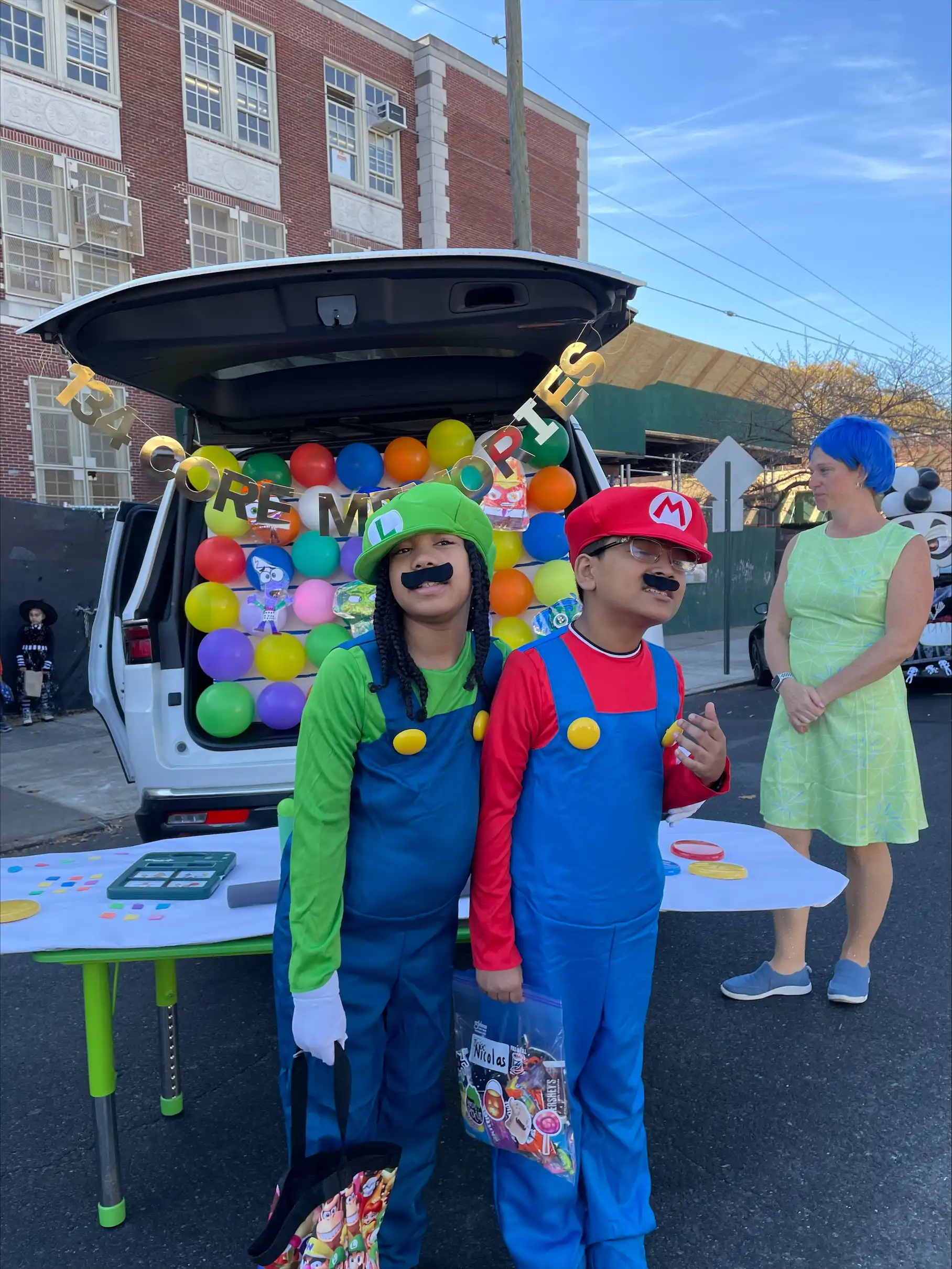 two students dressed as Mario and Luigi