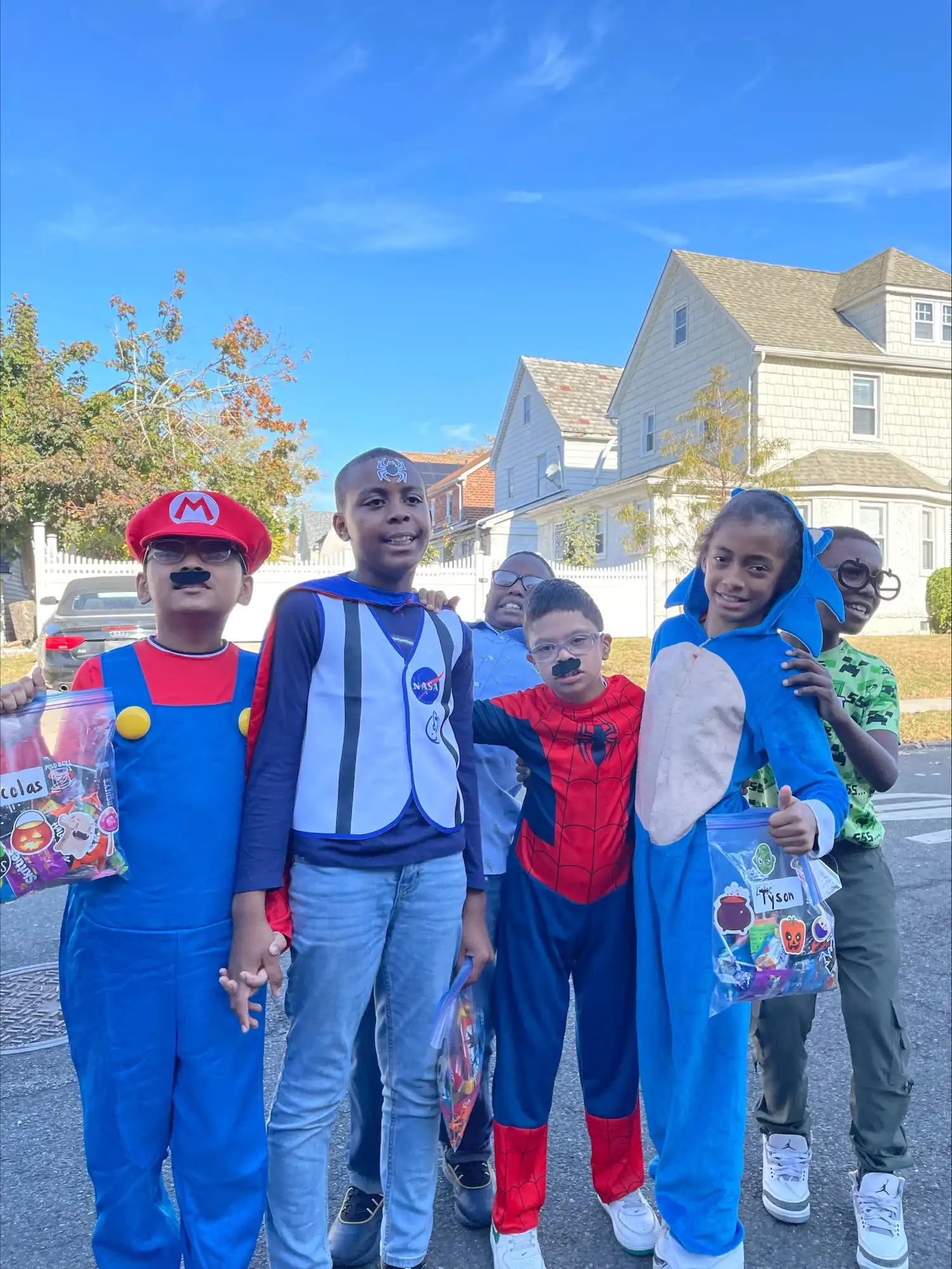 Students in Halloween costumes in the school yard