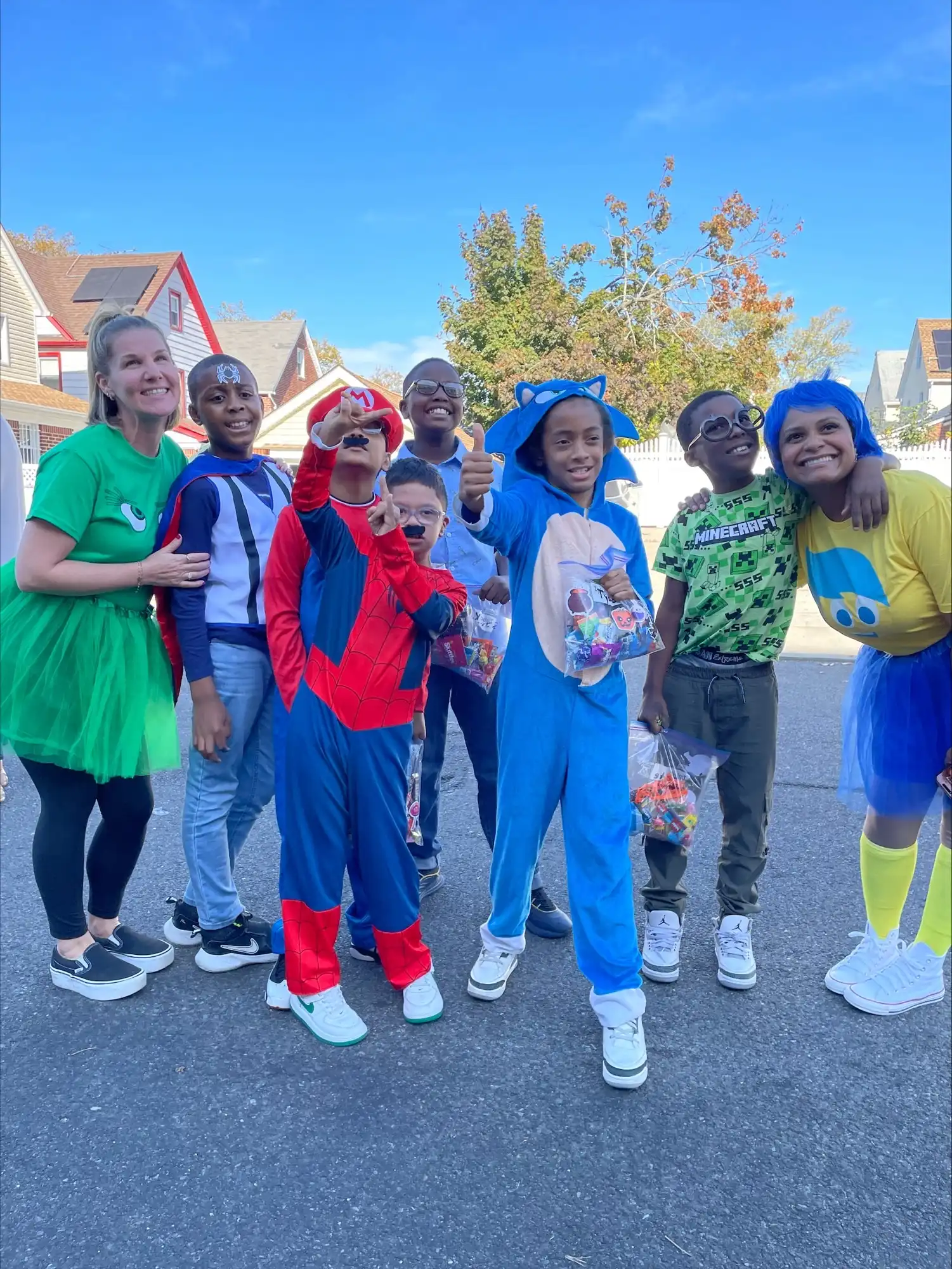 Students in Halloween costumes in the school yard