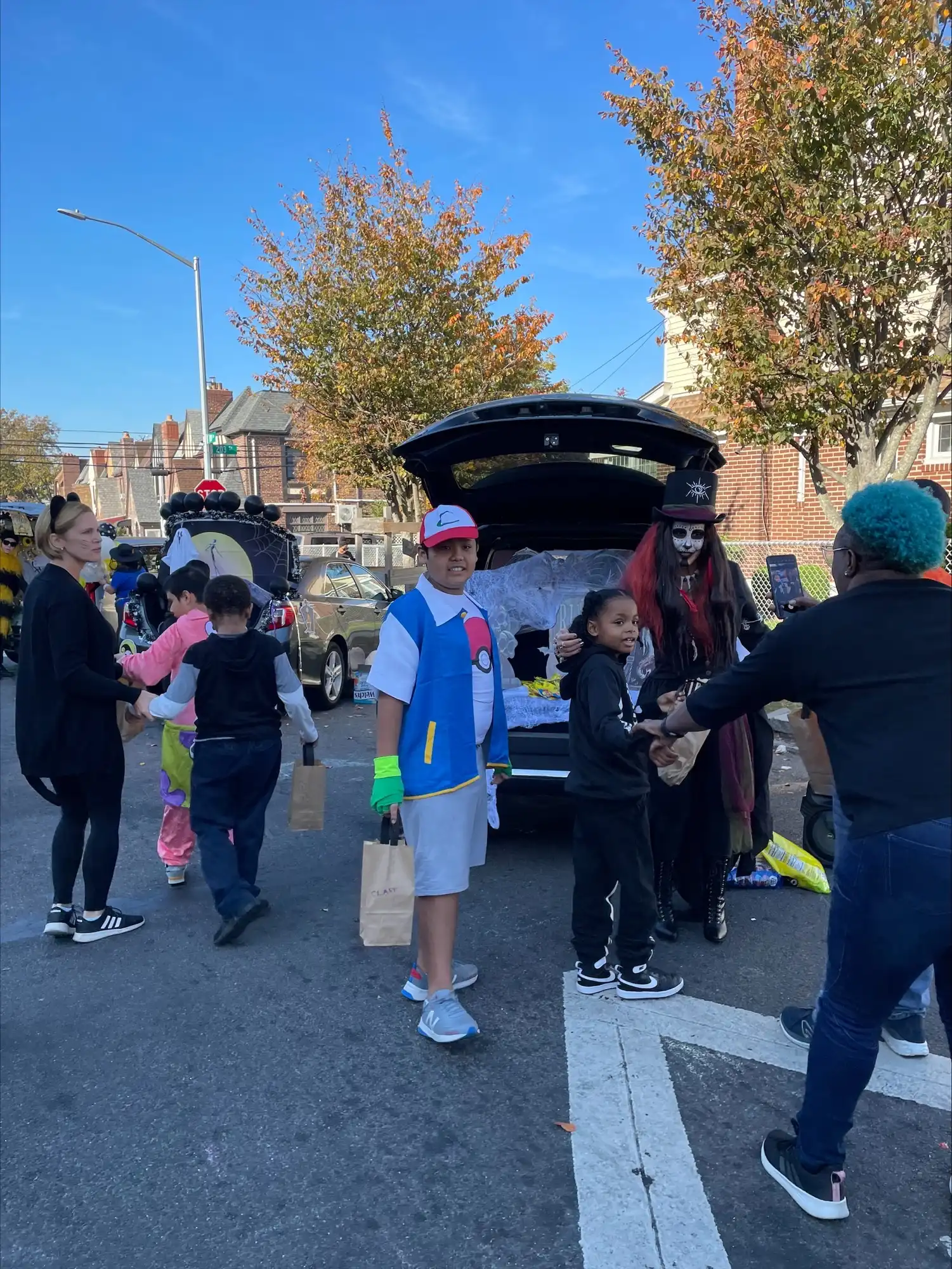 Students in Halloween costumes in the school yard